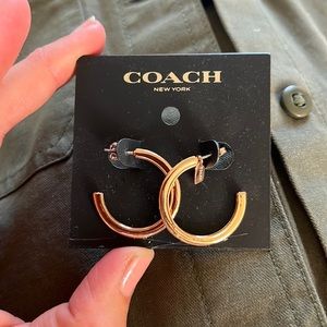Coach New York gold hoops earrings